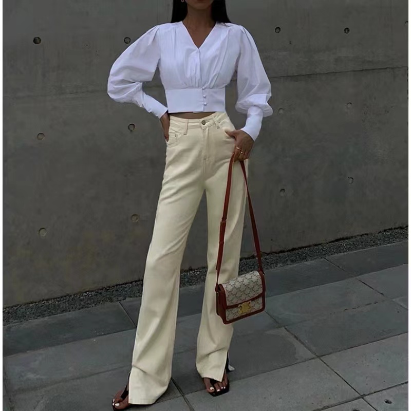 เสื้อเชิ้ตแขนยาวคอวีสีขาวการออกแบบหญิงความรู้สึกซอกใหม่เสื้อโคมไฟบาง ๆ